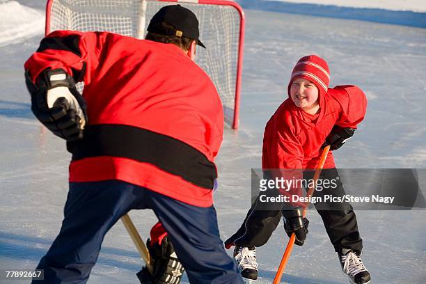 playing hockey - ice hockey day 9 foto e immagini stock