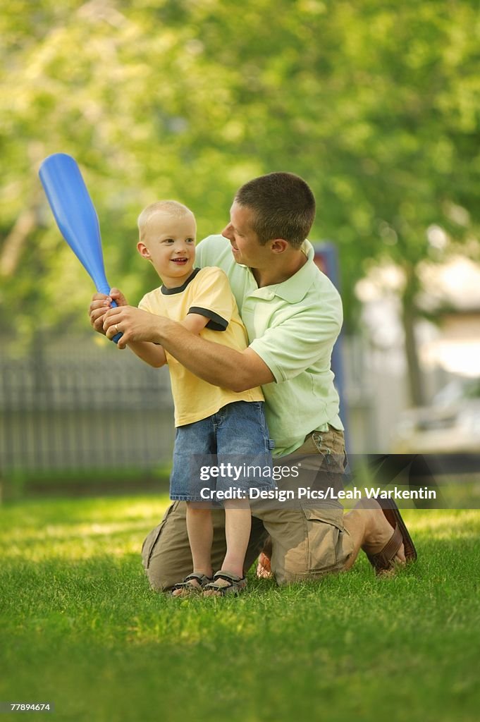 Father and son playing ball