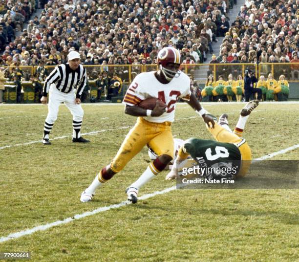 Washington Redskins Hall of Fame wide receiver Charley Taylor heads upfield in a 17-6 win over the Packers in Green Bay in 1974.