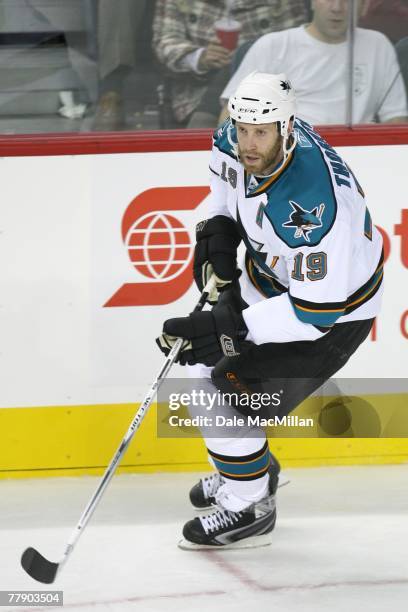 Joe Thornton of the San Jose Sharks skates during the NHL game against the Calgary Flames at the Pengrowth Saddledome on October 22, 2007 in Calgary,...