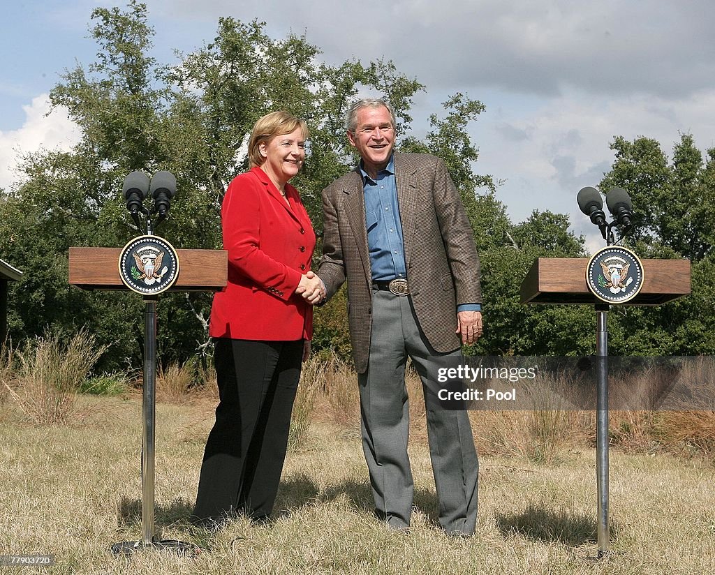 George Bush And Angela Merkel Hold News Conference