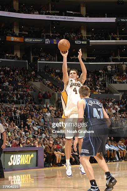 Luke Walton of the Los Angeles Lakers takes a jump shot against Andrei Kirilenko of the Utah Jazz during the game at Staples Center on November 4,...