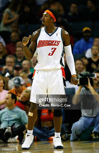 Gerald Wallace of the Charlotte Bobcats celebrates a three-point basket against the Miami Heat during the second half at Charlotte Bobcats Arena...