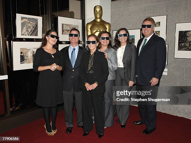 Members of actor John Wayne's family, Kathryn McFarlane, Christopher Wayne, Gretchen Wayne, Josie Wayne, Maria King and Lance King pose wearing 3D...