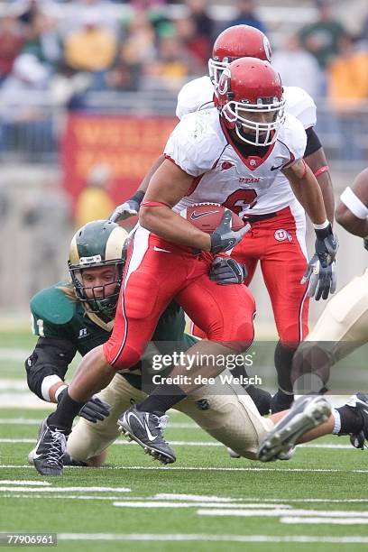 Darrell Mack of the University of Utah Utes runs during the game against the Colorado State University Rams at Hughes Stadium in Fort Collins,...