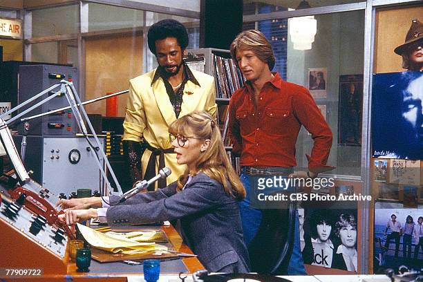 American actress Jan Smithers operates the broadcast booth, watched by Tim Reid and Gary Sandy , in a scene from an unidentified episode of the...
