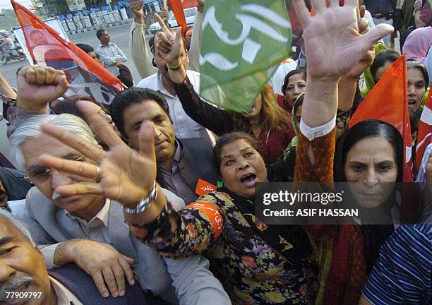 Activists of Pakistan People's Party of former premier Benazir Bhutto shout anti-government slogans as they march during a protest in Islamabad, 14...