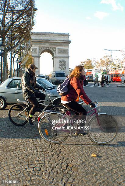 People ride bicycles, 14 November 2007 in Paris, during a strike against government's reform. French unions launch open-ended strikes in public...