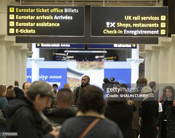 Passengers use the Eurostar terminal at the St Pancras International train station in north London, 14 November 2007. Eurostar zoomed into a new era...