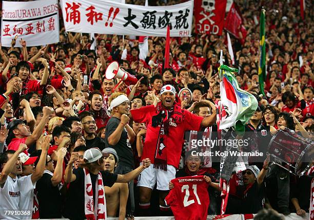 Washington celebrates in the crowd with fans of Japan's Urawa Red Diamonds after defeating Iran's Sepahan during the AFC Champions League Final 2nd...