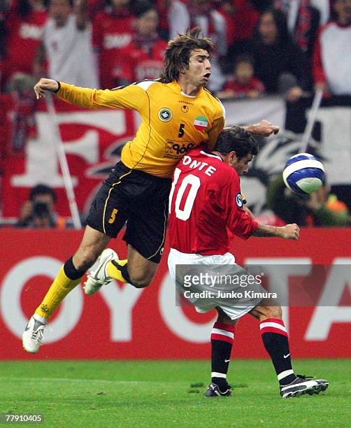Robson Ponte of Urawa Reds and Seyed Hadi Aghily Anvar of Sepahan in action during the AFC Champions League Final second leg match between the Urawa...