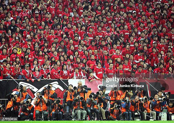 Urawa Reds fans cheer during the AFC Champions League Final second leg match between the Urawa Reds and Sepahan at Saitama Stadium on November 14,...