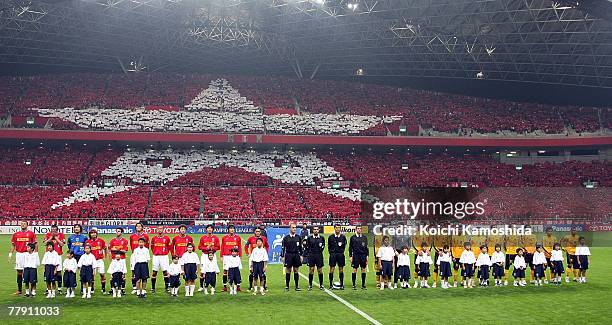 Players of Japan's Urawa Reds and Iran's Sepahan line up prior to kick-off of the AFC Champions League Final 2nd leg Urawa Reds v Sepahan at Saitama...