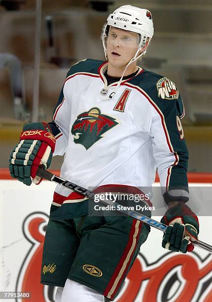 Mikko Koivu of the Minnesota Wild skates during warmups before the hockey game against the Colorado Avalanche at the Pepsi Center on November 11,...