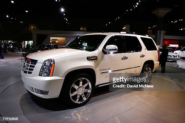 Cadillac shows its big hybrid Escalade SUV during a two-day media preview of the Los Angeles Auto Show, first major North American car show of the...