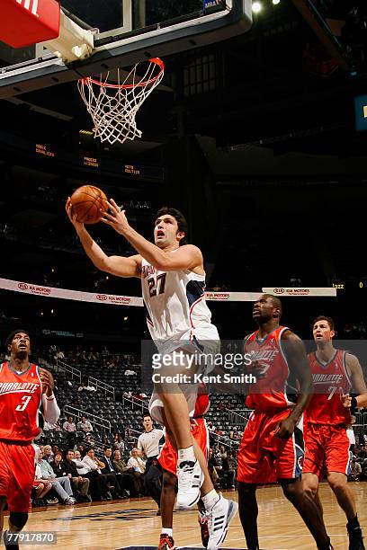 Zaza Pachulia of the Atlanta Hawks shoots against the Charlotte Bobcats on November 14, 2007 at the Philips Arena in Atlanta, Georgia. NOTE TO USER:...