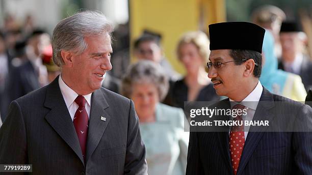 Uruguay President Tabare Vazquez Rosas talks with the King of Malaysia, Tuanku Mizan Zainal Abidin , during a welcoming ceremony at the parliament in...