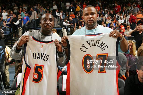 Major League Baseball pitchers Dontrelle Willis and this year's Cy Young Winner C. C. Sabathia enjoy watch the game and are given their own jerseys...