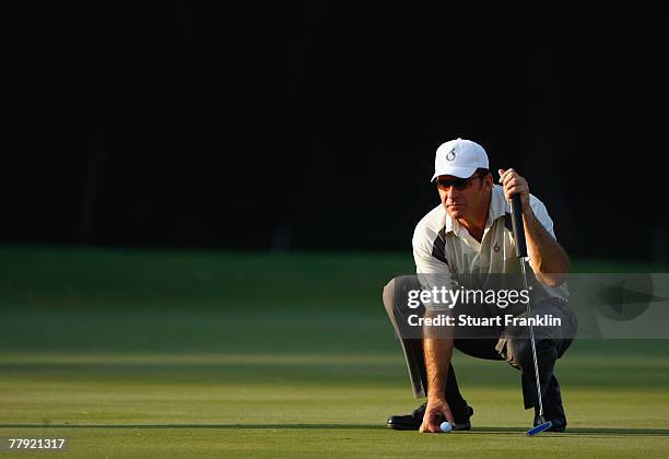 Nick Faldo of England lines up his putt on the 17th hole during the first round of the UBS Hong Kong Open at the Hong Kong Golf Club on November 15,...