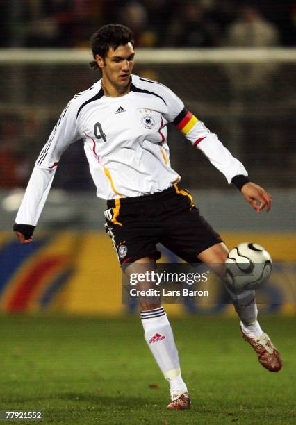 Kevin Pezzoni of Germany runs with the ball during the U19 international friendly match between Germany and England at the Waldstadium on November...