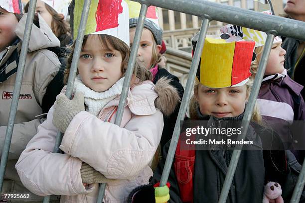 Children wearing Belgian Hats wait for the Royalties in front of St G?dule Cathedral before the Te Deum , on Kings Day on November 15, 2007 in...