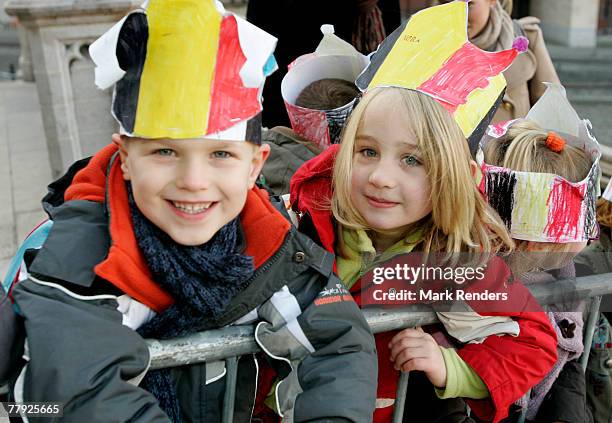 Children wearing Belgian Hats wait for the Royalties in front of St G?dule Cathedral before the Te Deum , on Kings Day on November 15, 2007 in...