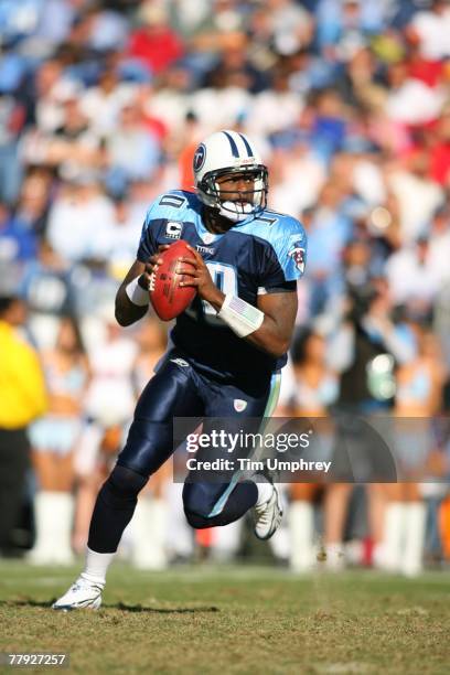 Quarterback Vince Young of the Tennessee Titans scrambles in a game against the Carolina Panthers at LP Field on November 4, 2007 in Nashville,...