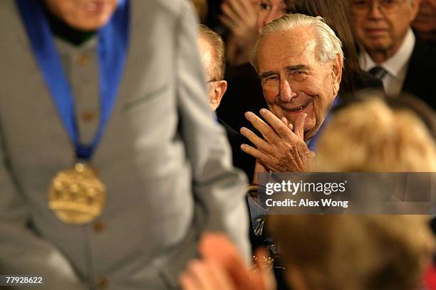 Henry Z. Steinway applauses during the presentation ceremony of 2007 National Medals of Arts and National Humanities Medals in the East Room of the...