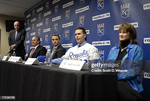 General manager Dayton Moore of the Kansas City Royals, manager Trey Hillman and his wife, Marie Hillman, answer questions during a press conference...