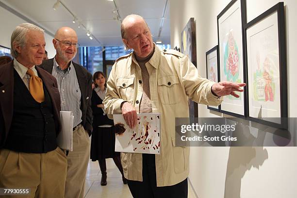 Artist Gahan Wilson discusses his piece on display during a press preview of the Metropolitan Opera's and The New Yorker's exhibition of "Hansel and...