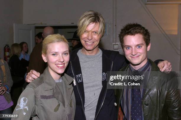 Scarlett Johansson, David Bowie, and "The Lord of the Rings" Trilogy star Elijah Wood seen backstage at BOWIE's first concert visit to Los Angeles in...