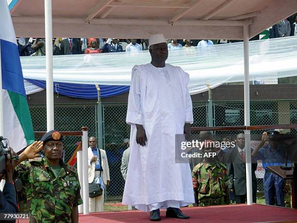 Sierra Leone's newly elected President Ernest Bai Koroma stands on a podium during his investiture ceremony 15 November 2007 in Freetown. Koroma a...