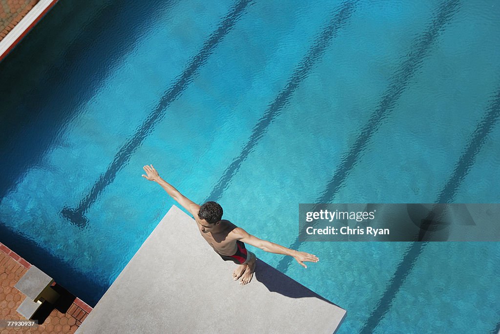 Diver standing on a diving board