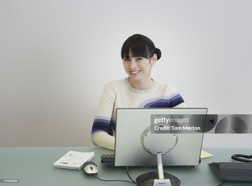 Businesswoman on computer in an office