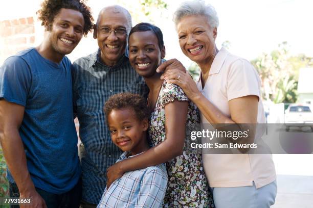 group of five people in front of house - multi generation family portrait stock pictures, royalty-free photos & images