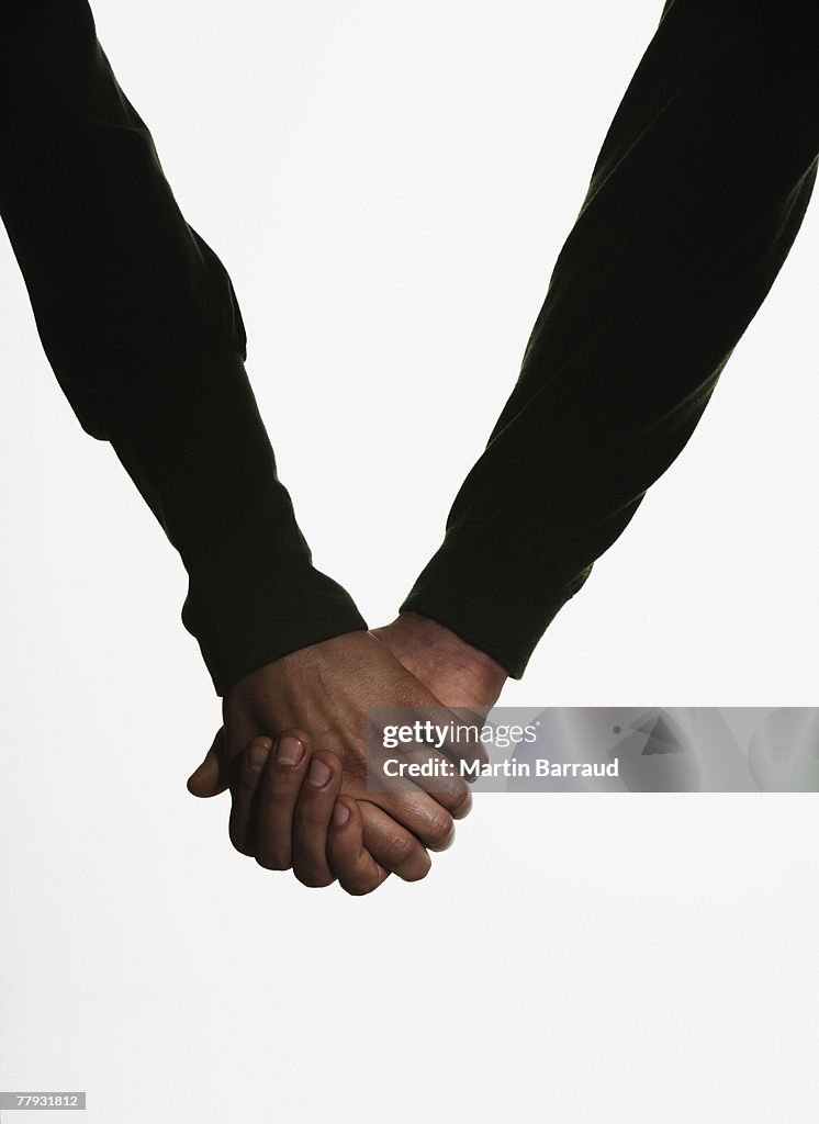 Arms holding hands