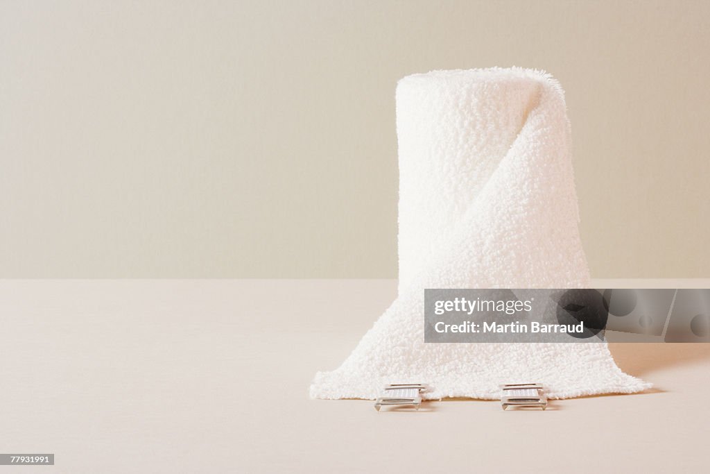 A roll of gauze sitting on a table