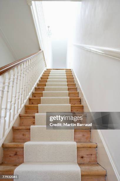 staircase with runner - carpet runner stock pictures, royalty-free photos & images