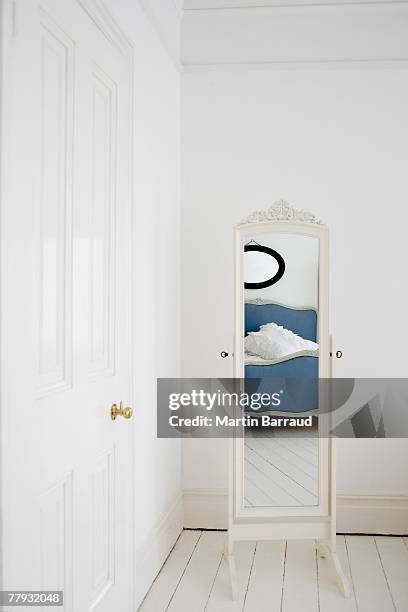 empty bedroom with mirror and bed - full length mirror stock pictures, royalty-free photos & images