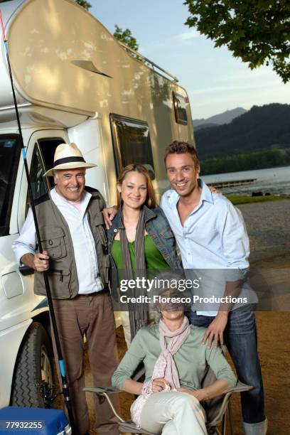 two couples outside recreational vehicle with fishing pole - esky - fotografias e filmes do acervo