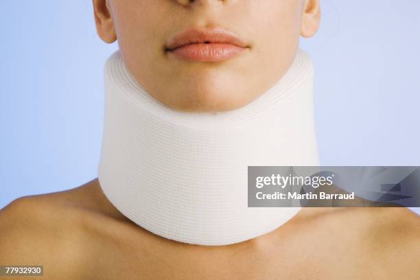 woman with whiplash - cervical collar stock pictures, royalty-free photos & images