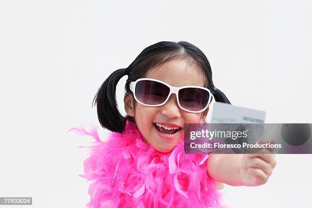 girl wearing sunglasses holding credit card - boa stock pictures, royalty-free photos & images