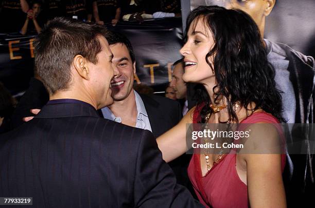 Tom Cruise, Steven Roy and Carrie-Anne Moss