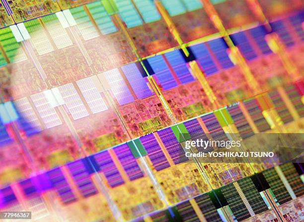 45nm process 300mm silicon wafer is displayed at a press conference as Intel Japan announces the launch of the new 45nm process microprocessors, Xeon...