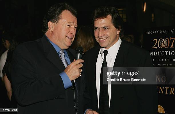 Former referee Ron Hoggarth with Kerry Goulet, Publisher of Icehockey World at the Hockey Hall of Fame press conference and photo opportunity on...