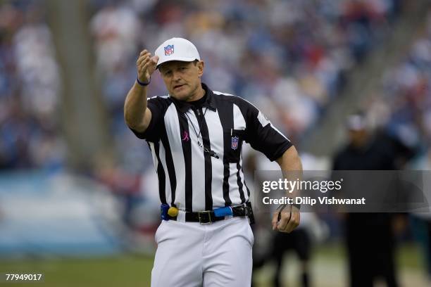 Referee Ed Hochuli signals a first down as the Jacksonville Jaguars play the Tennessee Titans on November 11, 2007 at LP Field in Nashville,...