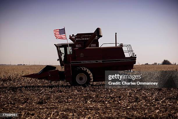 Early morning scenes around the important Caucus State of Iowa, October 28 in Algona, Iowa. A farmer shows his patriotism by flying the Stars and...