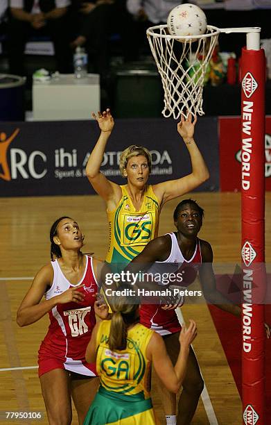 Catherine Cox of Australia shoots during the 2007 Netball World Championship semi final match between England and Australia at The Trusts Stadium on...