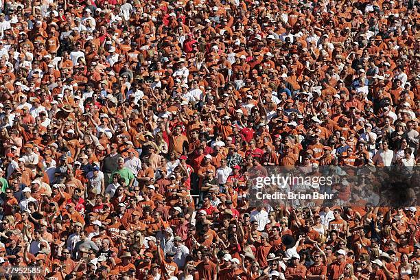 Fans of the Texas Longhorns cheer in the crowd during the game against the Nebraska Cornhuskers at Darrell K Royal-Texas Memorial Stadium October 27,...