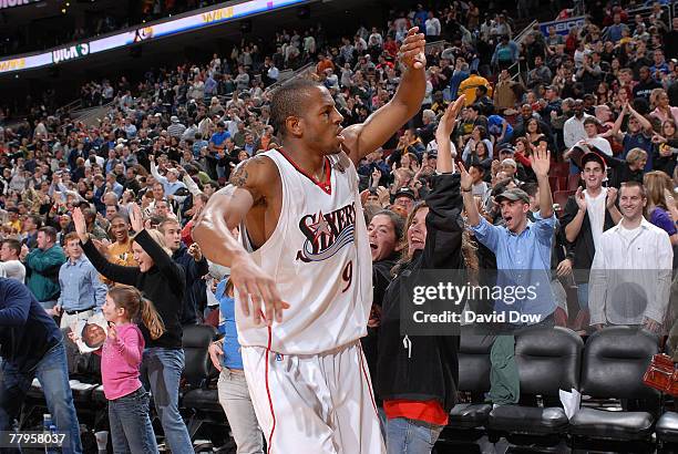 Andre Iguodala of the Philadelphia 76ers celebrates with fans after the game against the Portland Trail Blazers at the Wachovia Center November 16,...